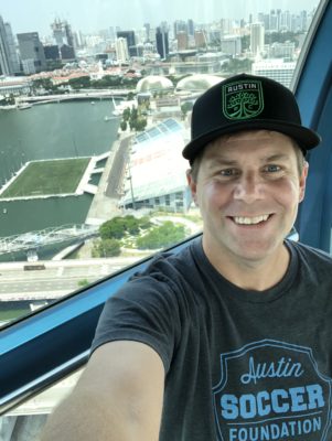 Shawn Collins representing Austin FC and the Austin Soccer Foundation in Singapore